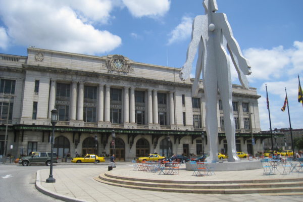 Baltimore Penn Station is a major multimodal transportation hub serving the greater Baltimore region and is a vital link along the busy Northeast Corridor. With its classic Beaux-Arts architecture, the historic station was built in 1911 and anchors the Charles North District in Baltimore City. As the 8th busiest station in Amtrak’s national system, Penn Station serves Amtrak’s high speed Acela Express, Northeast Regional and long-distance train services. In addition, the commuter operations of MARC’s Penn Line, the city’s light rail and bus service can all be accessed via the station.

Photo Credit: Amtrak