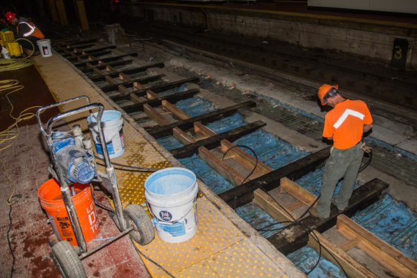 Amtrak engineering crews prepare to pour concrete on track bed at New York Penn Station