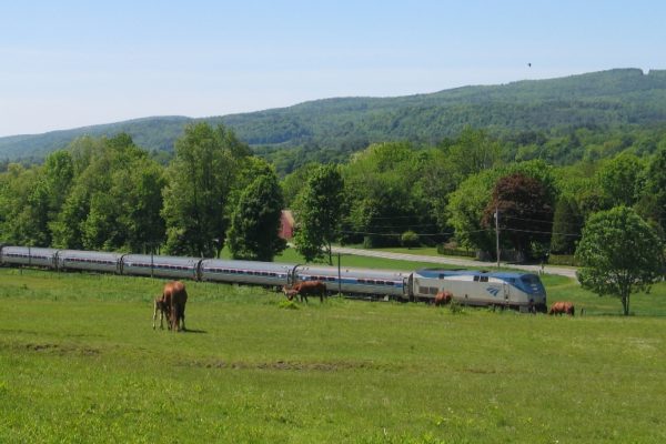 In this photo, the Vermonter ambles across the sprawling farmlands of its namesake state. You can experience the Green Mountain State’s scenic vistas and New England charm any time of the year.

Photo Credit: Amtrak
