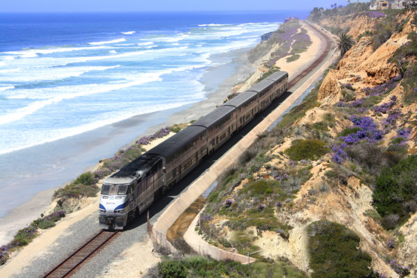 The Pacific Surfliner travels along the coastline in Del Mar, California. The Pacific Surfliner offers a unique vantage on the Southern California seascape connecting San Luis Obispo and San Diego through Los Angeles and Santa Barbara.

Photo Credit: Amtrak
