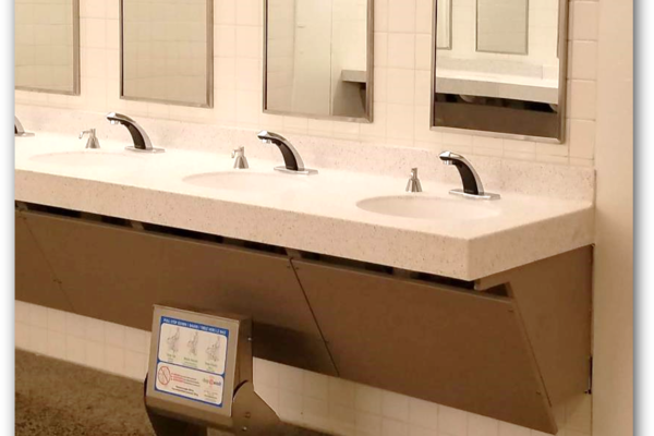 A floor-mounted, use-on-demand stepstool was installed in both restrooms to provide sink access.