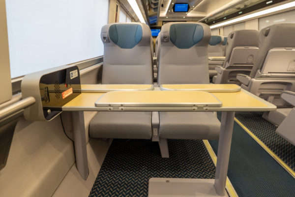 Additional Business Class amenities include these sleek tray tables, complimentary Wi-Fi, an advanced seat reservation system, an onboard info system providing  location, train speed and conductor announcements, and head rests with wings so you don’t fall asleep on your neighbor.
