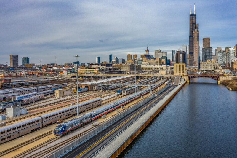 Overview of Amtrak Chicago Railyard and City Skyline