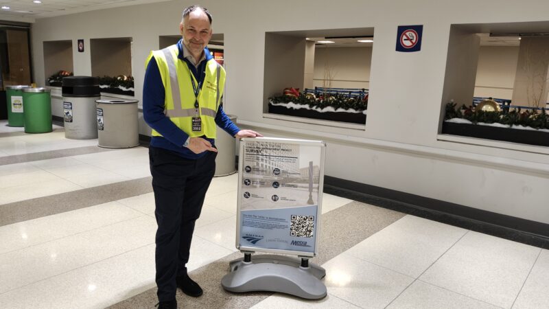 Amtrak CEO Stephen Gardner with CUS survey signage