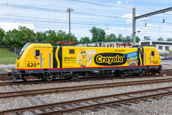 Amtrak Partners with Crayola to promote creativity on the go, including wrapping two ACS-64 Sprinter locomotives. Amtrak #620 "Dan D." celebrates the return of the color dandelion from retirement, and #621 features Crayola's colorful Tip characters with artistic doodles inspiring creativity. Photo by Matt Donnelly, Amtrak.