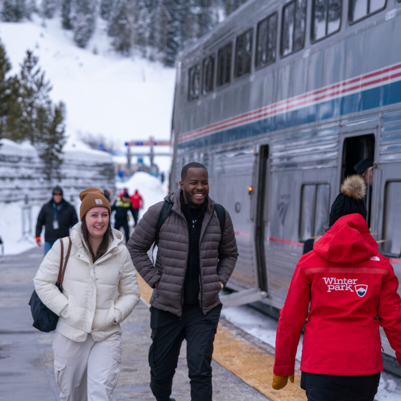 Amtrak customers and train at the Winter Park Resort platform