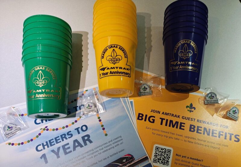 certificate, cups and pins for Amtrak customers
