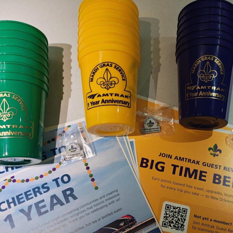 certificate, cups and pins for Amtrak customers